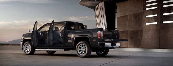 Photo showing the 2017 GMC Sierra 1500 pickup truck in park. 