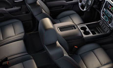 Photo of the comfortable and spacious interior of the 2017 GMC Sierra 1500 light-duty pickup truck.